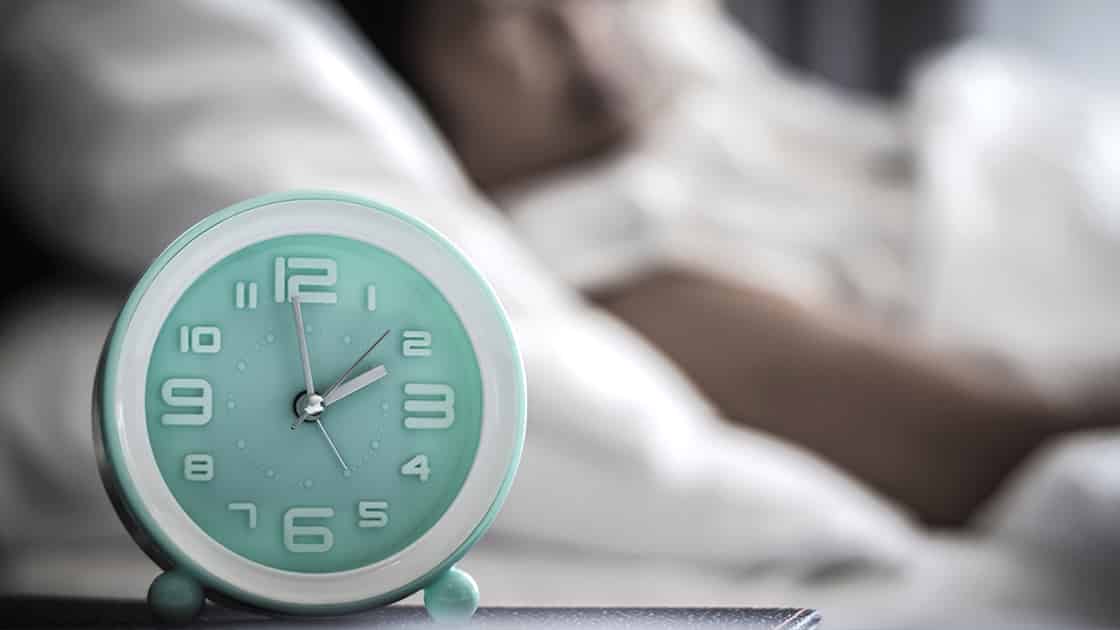 Alarm Clock by Bed Photo