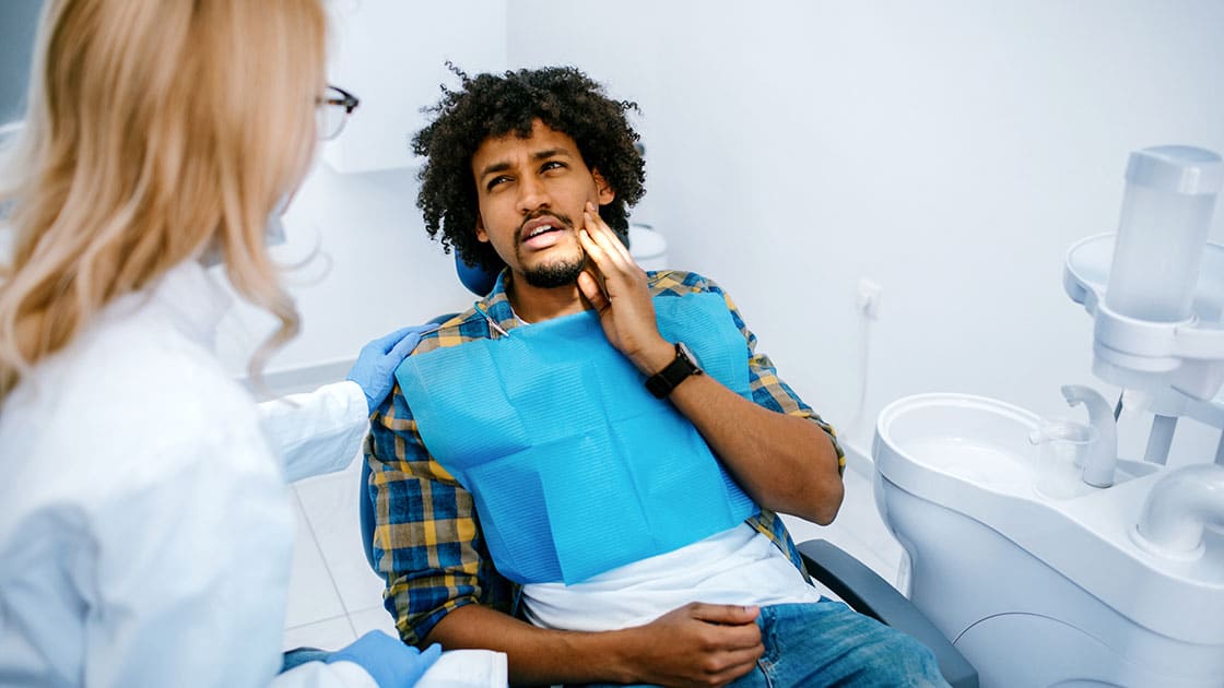 Man Describing Toothache Photo
